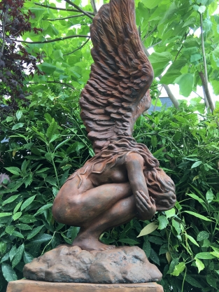 Very large kneeling oxide Angel with wings up on a large oxide pedestal, very large and unique!